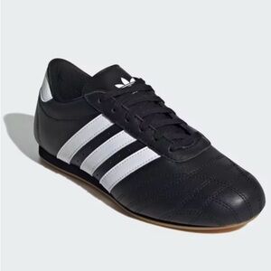 Adidas woman’s Black Sneakers with White Stripes